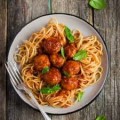 Spaghetti w/ Meatballs or Sausage
